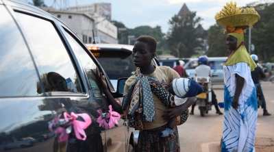 Kampala Street Children Gifts Ban [Isaac Kasamani/Al Jazeera]