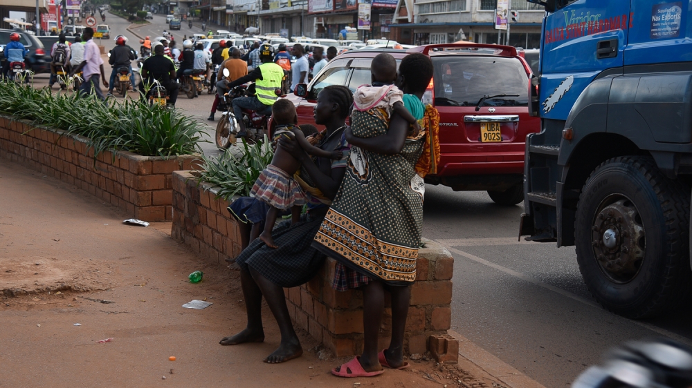 Kampala Street Children Gifts Ban [Isaac Kasamani/Al Jazeera]