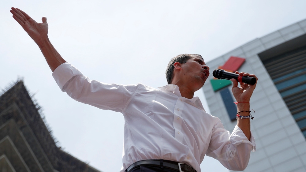 Guaido says people need to remain in the streets [Carlos Garcia Rawlins/Reuters]