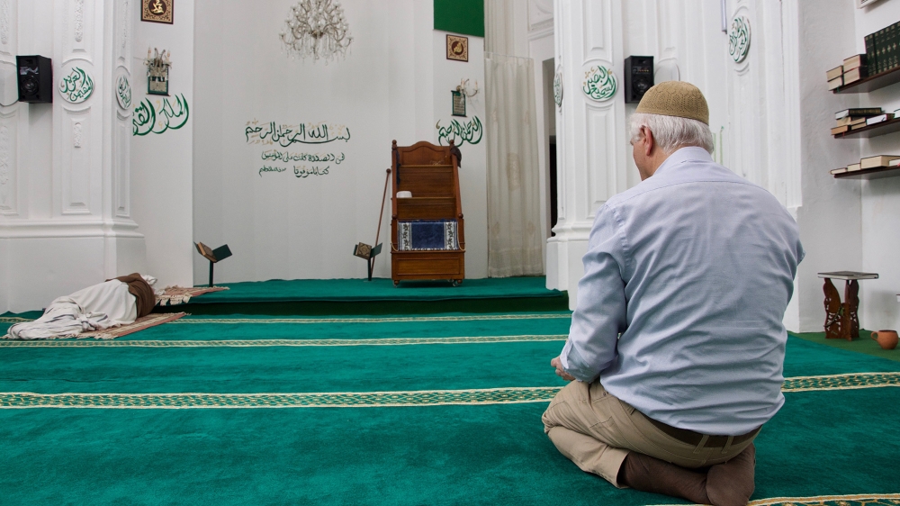 Imam Ahmed Abd Al Majid Macaluso prays at the Palermo Mosque, one of city’s 13 mosques [Savin Mattozzi/Al Jazeera]