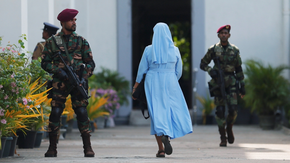 
Most churches outside Colombo had resumed regular services from last week but under tight security provided by the local police [Dinuka Liyanawatte/Reuters]
