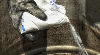 Fentanyl is added to a pot to make synthetic heroin [John Holman/Al Jazeera] 