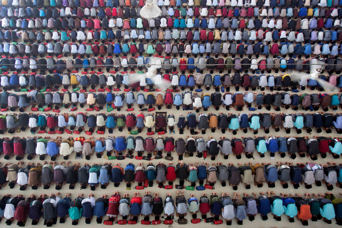 Students partake in the mid-day prayer during the first day of the holy fasting month of Ramadan at Ar-Raudlatul Hasanah Islamic Boarding School in Medan, North Sumatra, Indonesia, Monday, May 6, 2019