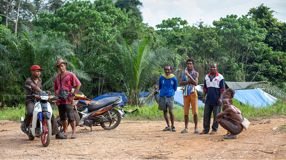 Village chief Mohamad Pokok (second from right) with villagers from Kuala Koh