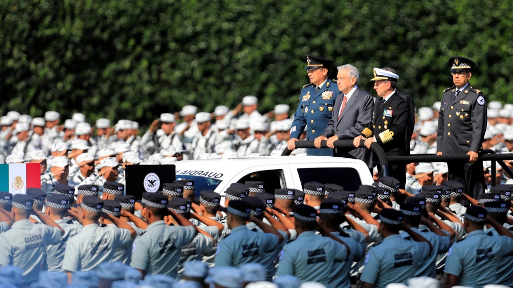 Members of the National Guard stand in formation as the government kicks off its new militarized National Guard police force