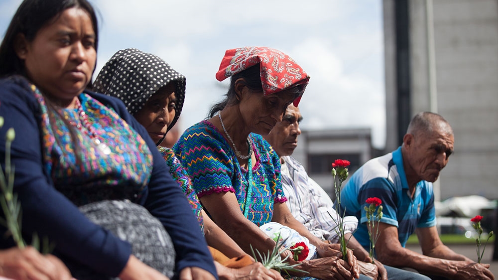 Achi Mayan survivors gather outside the Supreme Court before the hearing on June 21 for a ceremony in commemoration of the National Day of Forced Disappearance
