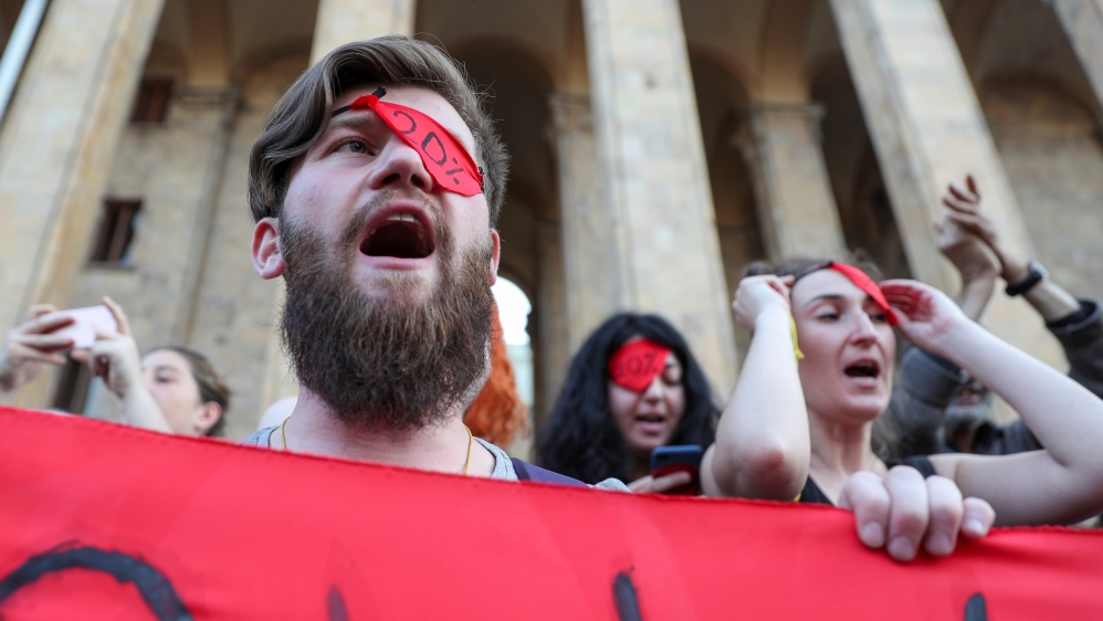 Protesters hold a rally against a Russian lawmaker's visit in Tbilisi