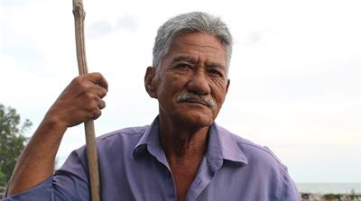 Fisherman Talib Seman on the jetty at Sungai Batu on the southern coast of the Malaysian island of Penang; the state government wants to create three artificial islands in the sea that he fears will destroy his livelihood
