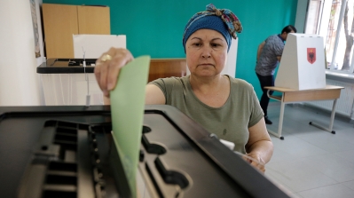 A woman casts a vote at a voting centre in Tirana, Albania June 30, 2019. REUTERS/Florion Goga