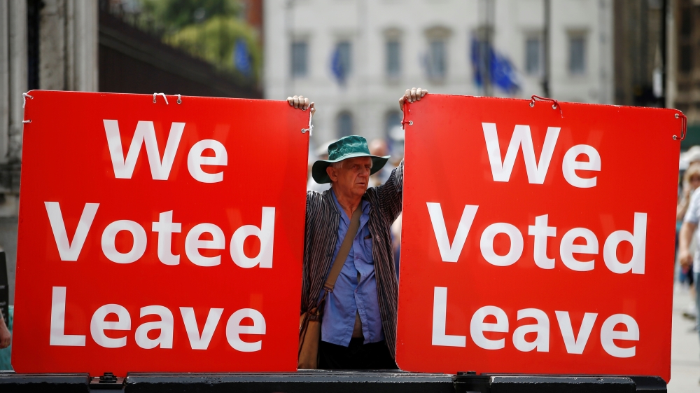 A pro-Brexit demonstator is seen outside the Houses of Parliament in London