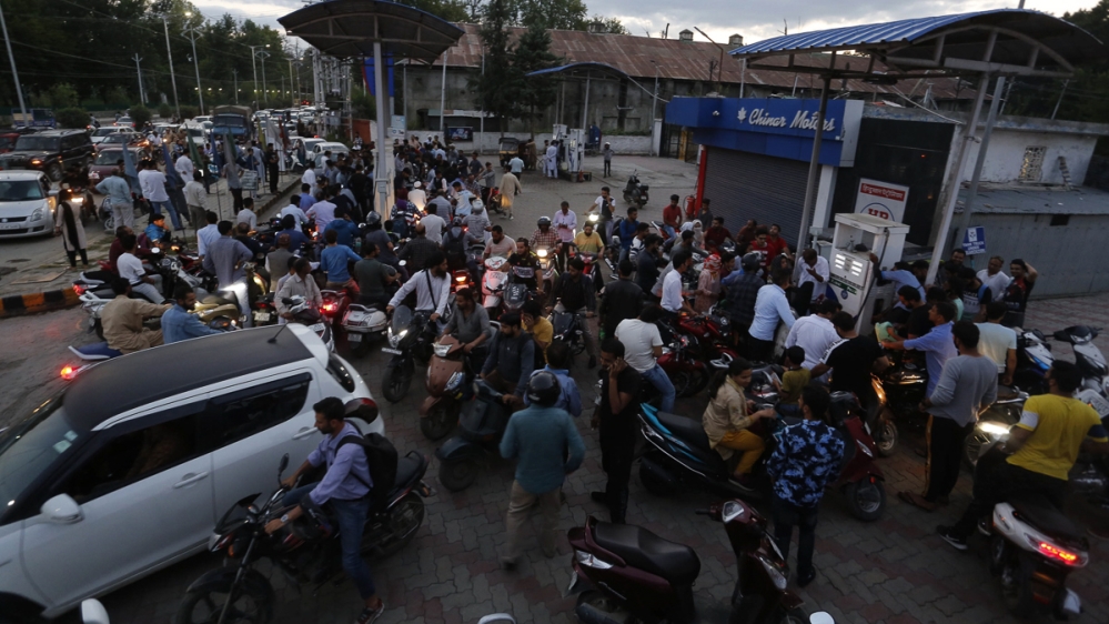 People wait at returning stations in Kashmir due to prevailing situation. [Shuaib Bashir/Al Jazeera]
