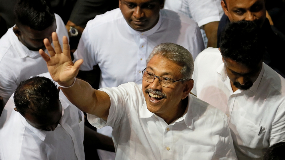 Sri Lanka''s former defense secretary Gotabaya Rajapaksa waves after he was nominated as a presidential candidate during the Sri Lanka People''s Front party convention in Colombo
