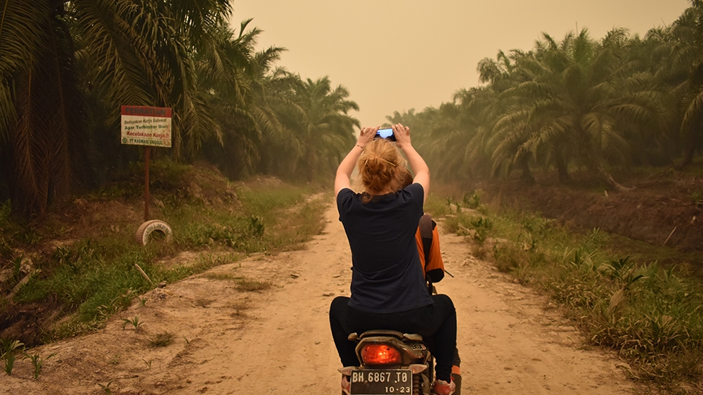 Aisyah Llewellyn on the road in Jambi in Indonesia, where devastating fires have been raging since July.