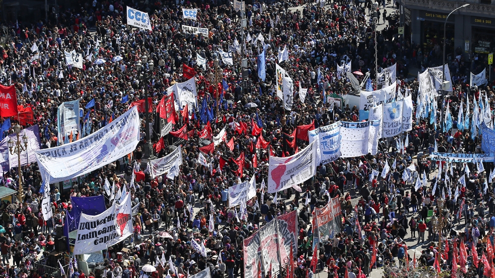 People attend a demonstration against economic measures of Argentine President Mauricio Macri's government