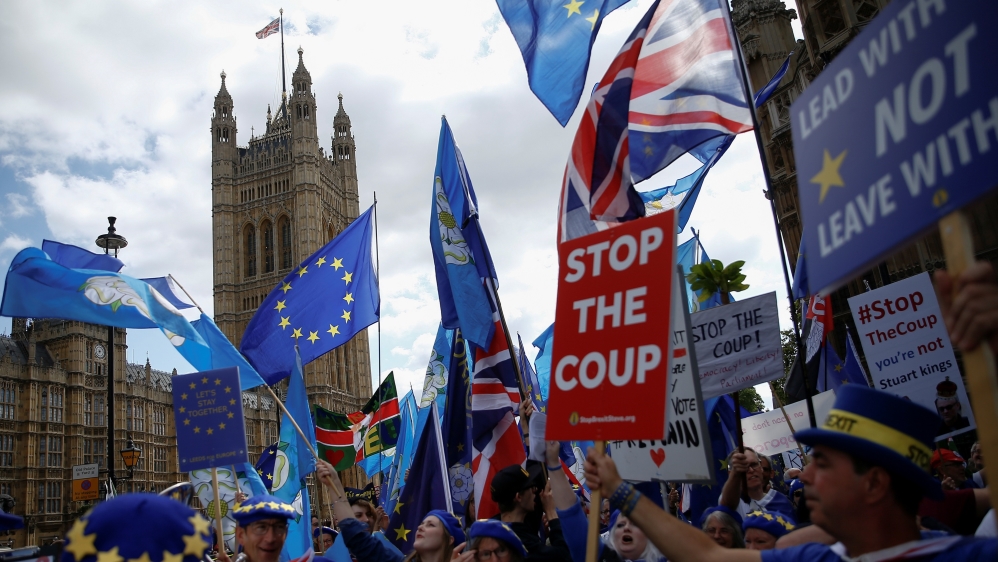 Anti-Brexit protester Steve Bray holds a placard as he attends a demonstration outside the Houses of the Parliament in London, Britain September 3, 2019