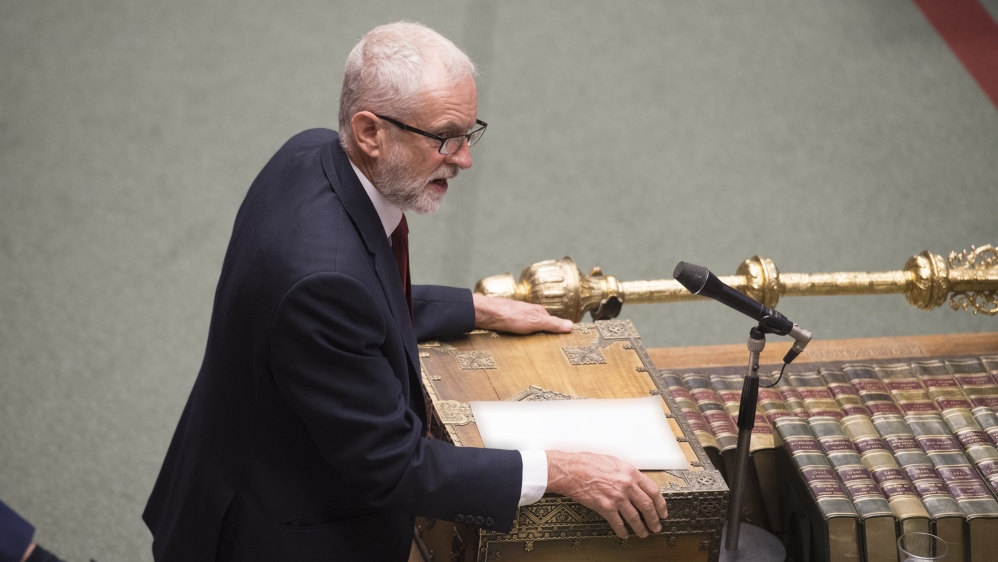 A handout photo made available by the UK Parliament shows Labour opposition leader Jeremy Corbyn gesturing during Prime Ministers Questions (PMQS)