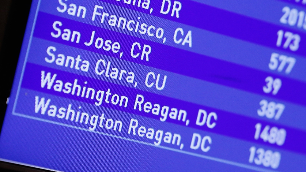 A flight board at Fort Lauderdale International Airport showsdale