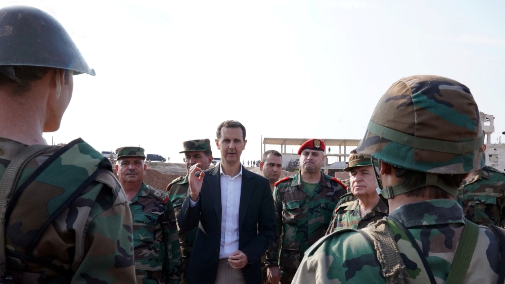 Syrian President Bashar al Assad visits Syrian army troops in war-torn northwestern Idlib province