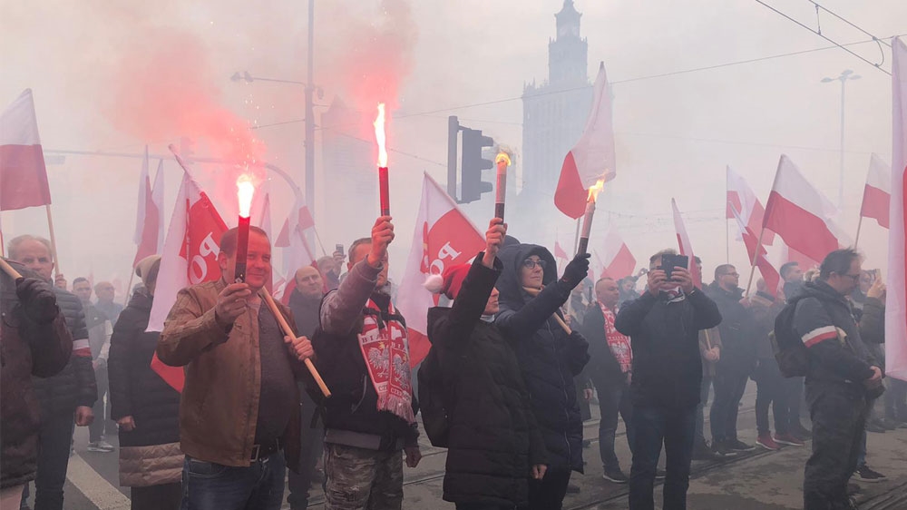 People lit flares and prayed ahead of the march