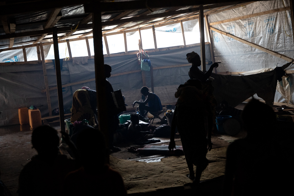 A family of 42 people lives amongst the other displaced in a large tent at the Socada site. “We need mats, covers, and clothes,” says Rigoberta Gueremondere, 19 years old (center of the image). “We’ve