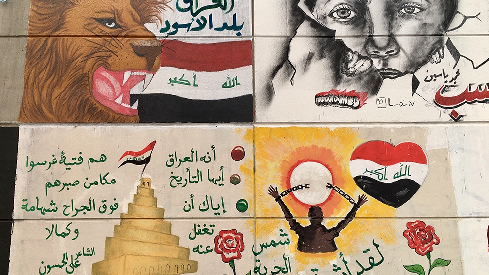  A mural inside Tahrir tunnel depicts the lion of Babylon among Iraqi flags  [Sofia Barbarani/Al Jazeera]