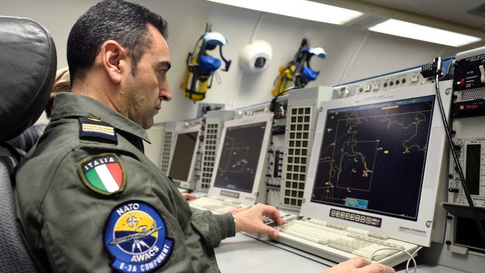 NATO and Boeing sign a contract on upgrades to the alliance''s fleet of AWACS reconnaissance planes, at Melsbroek Air Base in Brussels