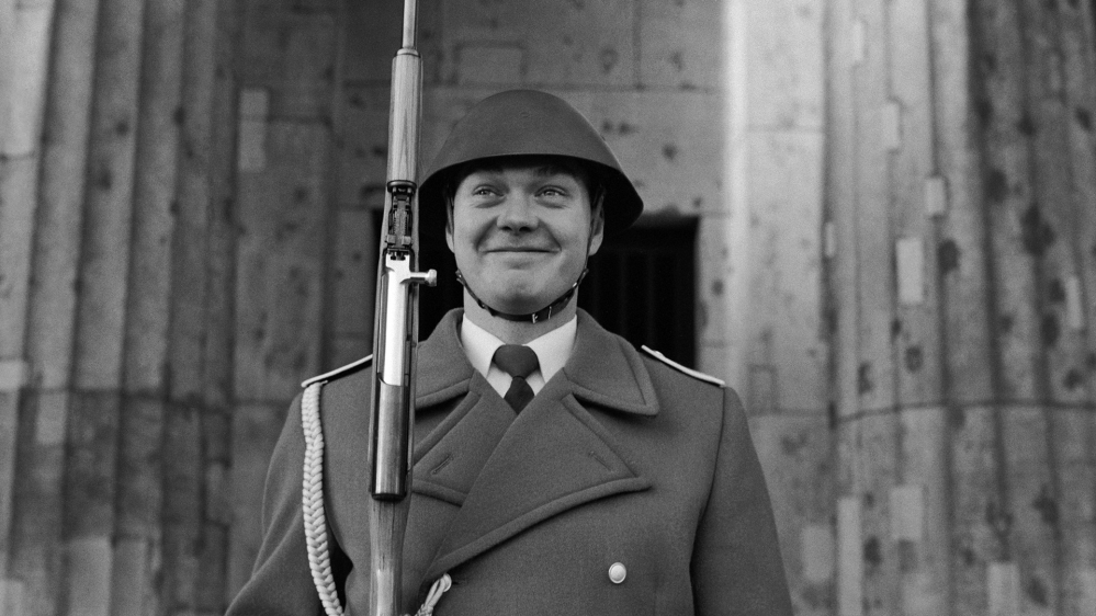 Just as he saw the Berlin Wall go up in August 1961, Leonard Freed returned on November 12, 1989, days after the border was breached. He captured images of an East German soldier standing outside the Neue Wache, the GDR war memorial on Unter den Linden. Freed recalled of that day: “Yesterday, if he had smiled while on guard duty this East German soldier would have been court-martialed. Today he can smile because he knows it will soon be over, the Wall has been breached.” Freed photographed the guard several times, from up close, waiting to get a frame in which he smiled back at the camera