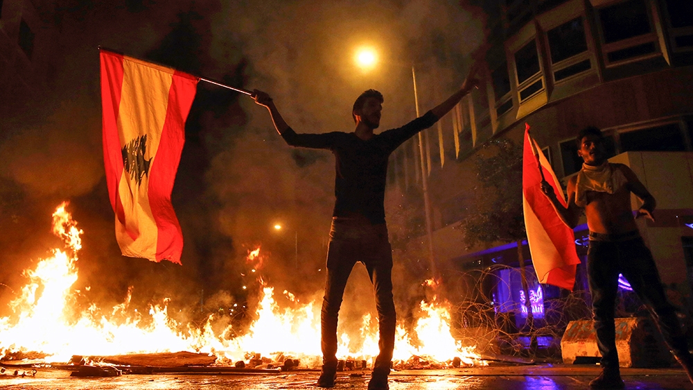 Hope, defiance as Lebanon protests enter second month