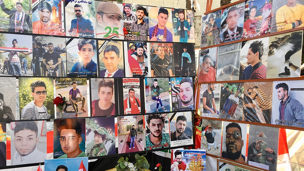 Photographs of dead protesters in a memorial tent in Ummah Garden, next to Tahrir Square