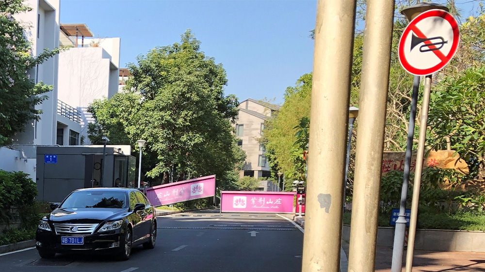 The high-security Bauhinia Villa is situated in a leafy Shenzhen suburb just across the border from Hong Kong.