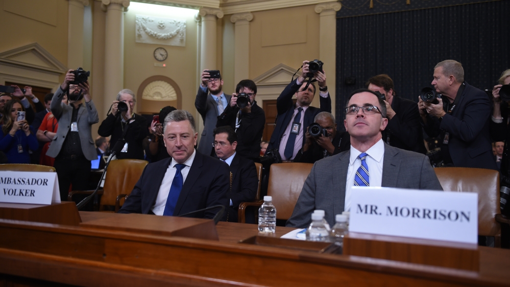 Former US Special Envoy for Ukraine, Kurt Volker (L), and Tim Morrison, the top Russia and Europe adviser on President Donald Trump's National Security Council, prepare to testify during the House Int