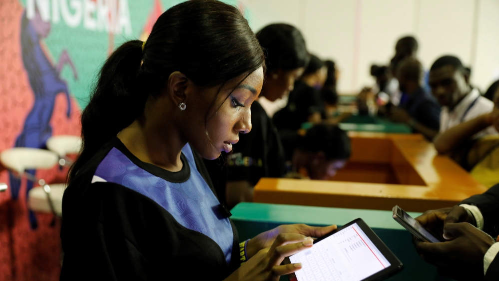 Youths are seen browsing the internet inside the venue of the launch of Google free wifi project in Lagos, Nigeria July 26, 2018
