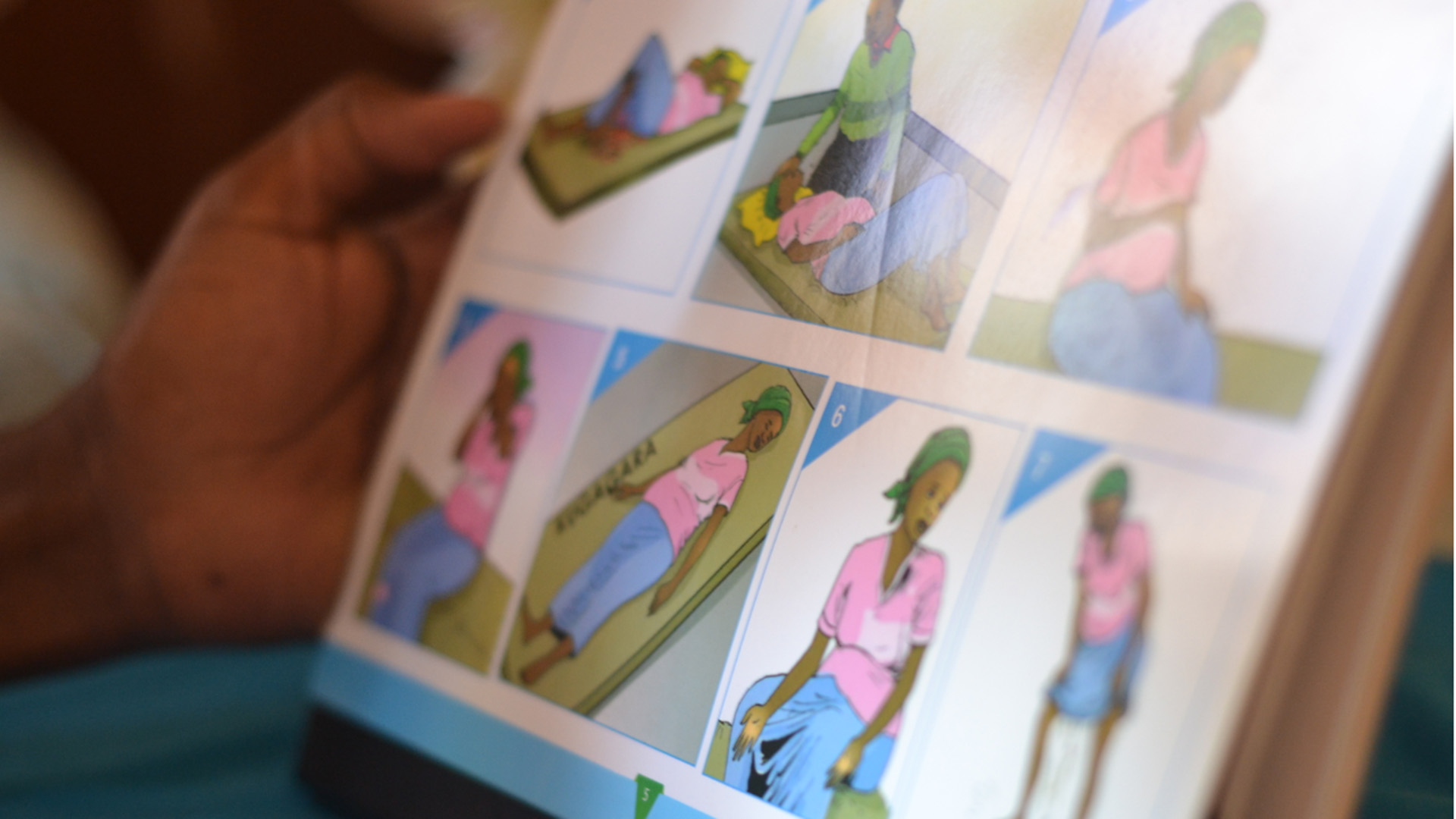 Community health workers use visual material to educate pregnant mothers