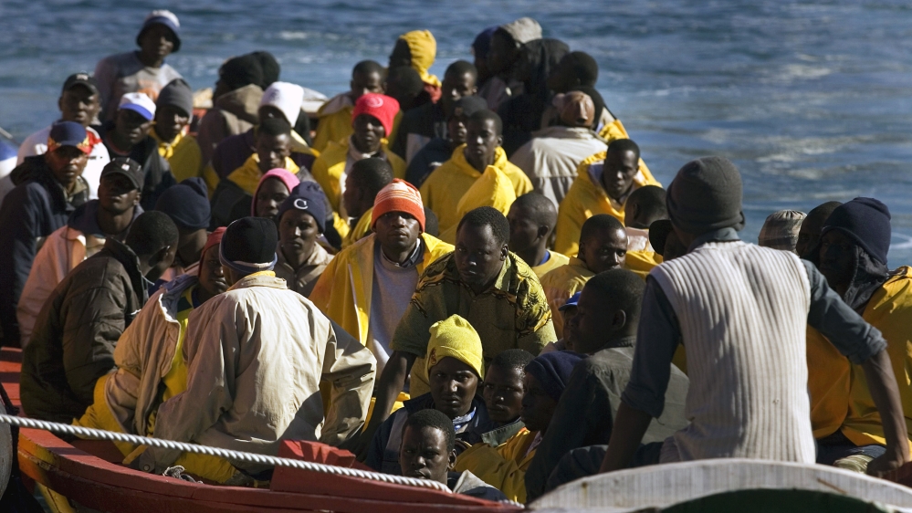 African immigrants arrive in a fishing boat carrying 60 to the port of Los Cristianos, in the Canary island of Tenerife, Spain, Thursday, Feb. 1, 2007. More than 31,000 migrants, mostly from Africa, r