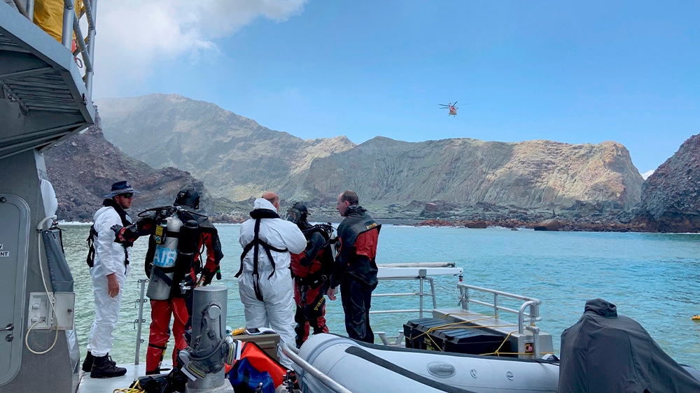 Police divers have been searching for survivors in the waters near White Island [New Zealand Police via AP Photo]