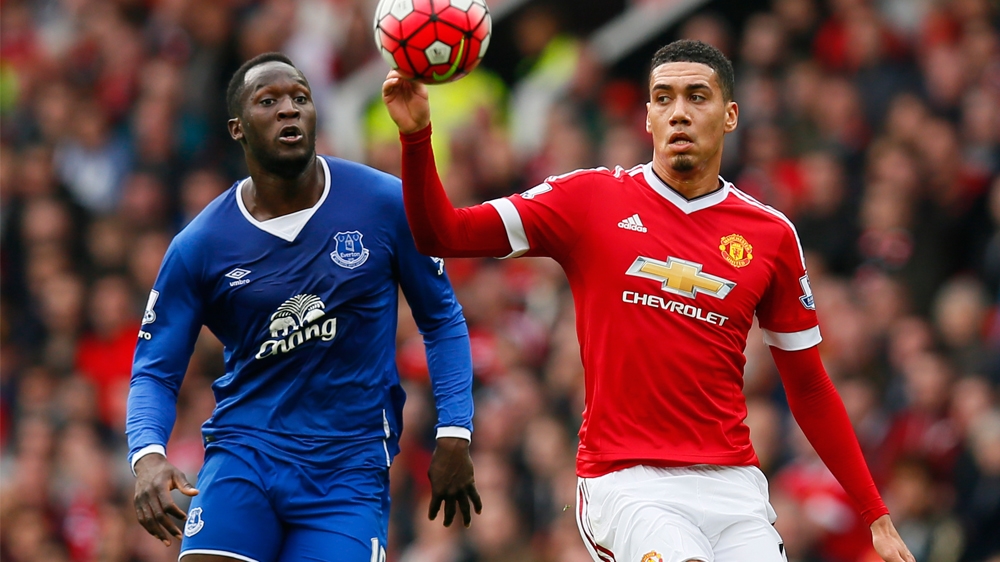 Football Soccer - Manchester United v Everton - Barclays Premier League - Old Trafford - 3/4/16 Manchester United''s Chris Smalling in action with Everton''s Romelu Lukaku Action Images via Reuters