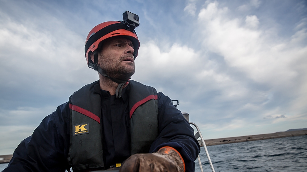 Salvador Perello on a rescue lifeboat during a rescue simulation in the port of Palermo