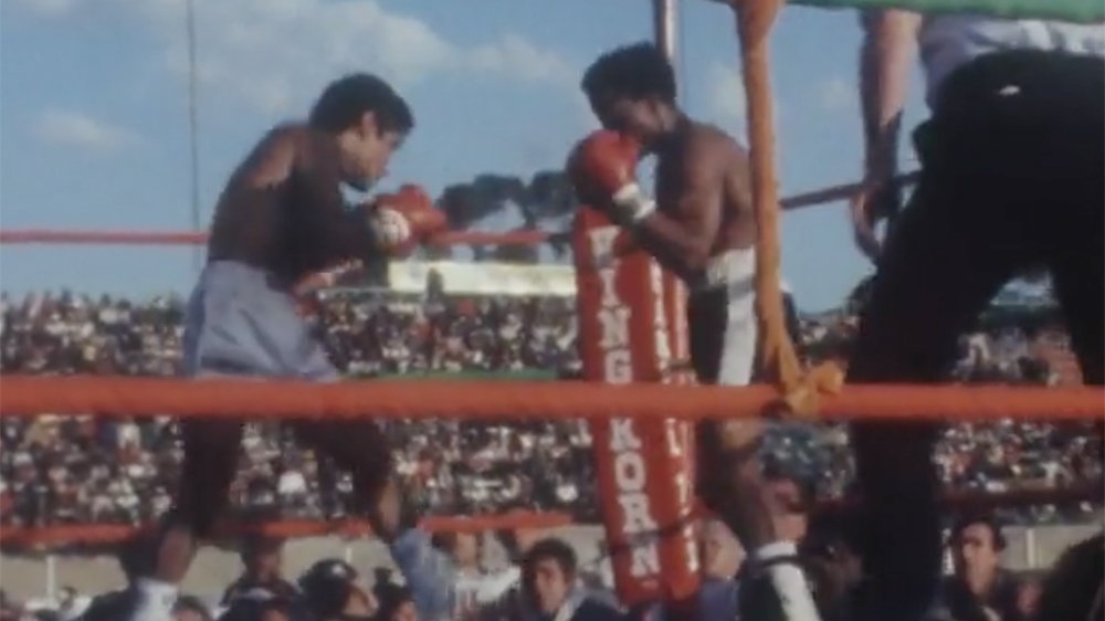SANTOS LACIAR (ARGENTINA - White shorts) DEFEATS PETER MATHEBULA (SOUTH AFRICA - Black shorts) TO WIN W.B.A. FLYWEIGHT CHAMPIONSHIP. {Screengrab/Reuters]