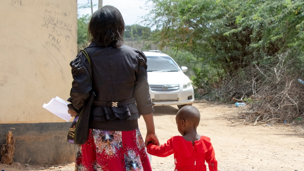 Angeline Munanie, a teacher at Warable Primary School in Garissa County, is terrified for herself and her child [Abdullahi Mire/Al Jazeera]