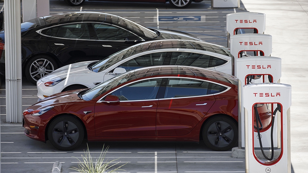 Tesla Inc. Model 3 electric vehicles charge at the Tesla Supercharger station in Kettleman City, California, U.S., on Wednesday, July 31, 2019