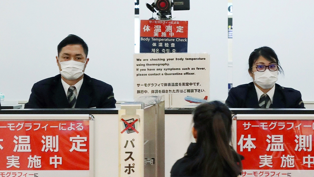 Japan stepped up screening of airline passengers after a man was reported to have picked up the virus after visiting Wuhan