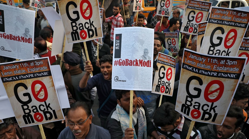 Demonstrators protest the visit of Indian Prime Minister Narendra Modi to West Bengal state’s Kolkata city