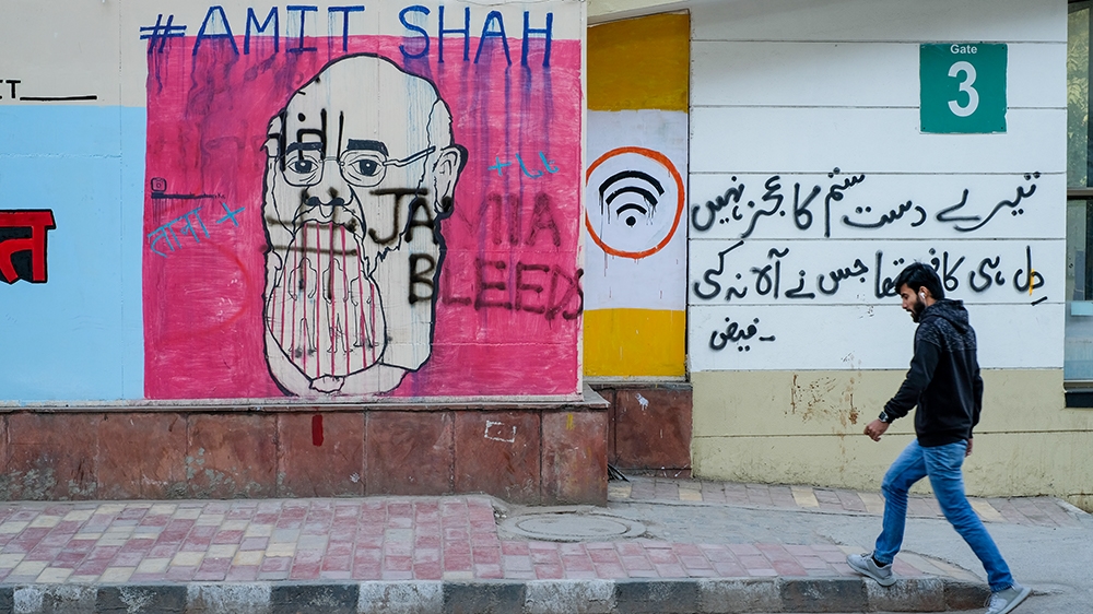 A graffiti at Jamia Millia Islamia University on police brutality at the campus [Courtesy of Agneya Singh]