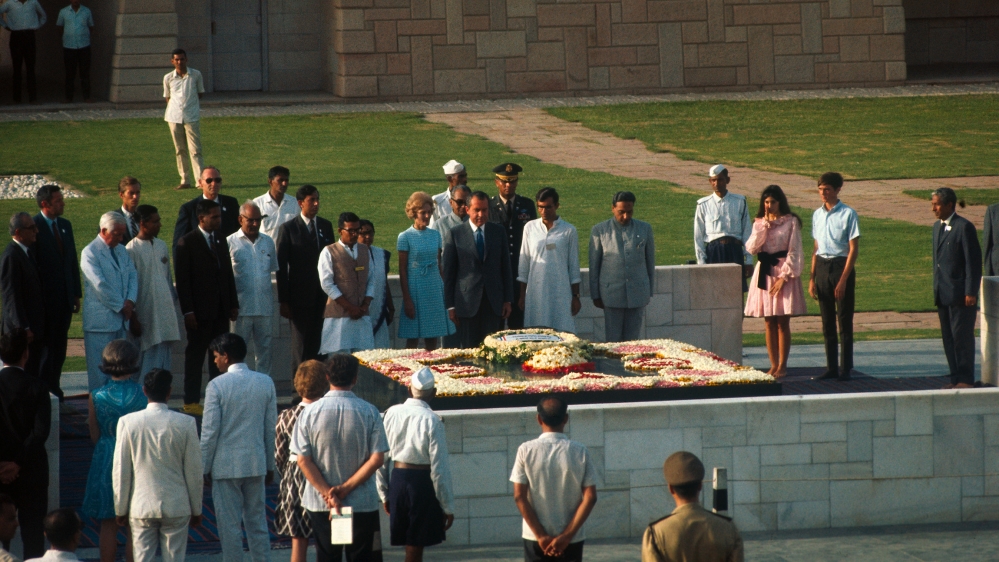 President Richard Nixon pays homage at the shrine of Mahatma Gandhi here July 31st. Mrs. Nixon also attended the ceremony, along with Indian government officials.