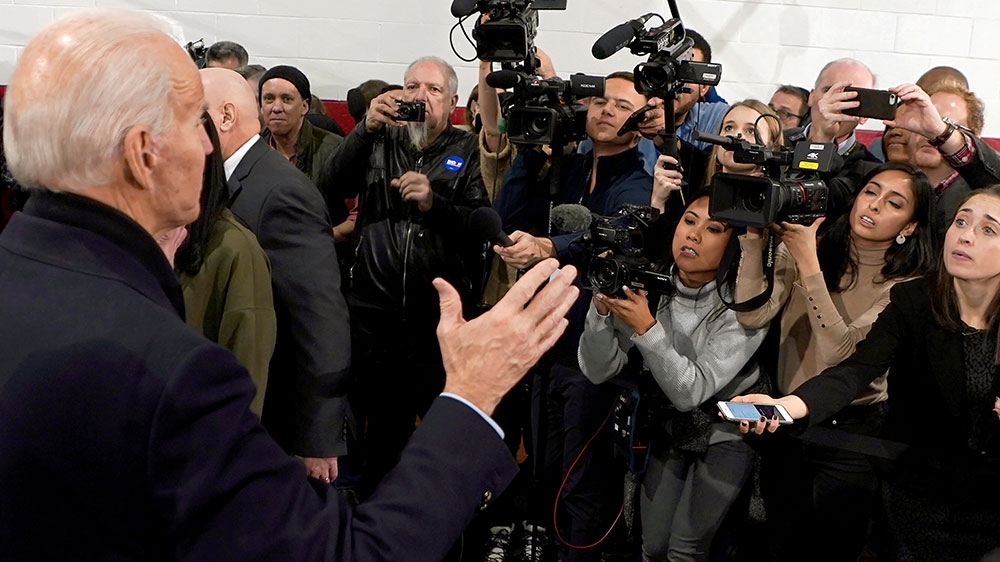 Democratic presidential candidate and former Vice President Joe Biden speaks to the media asking for his reaction to the Iowa caucuses after a campaign event in Nashua, New Hampshire