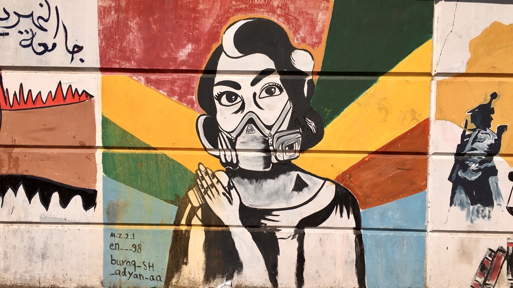 Men and women have painted murals in graffiti in the once-neglected areas of Tahrir Square