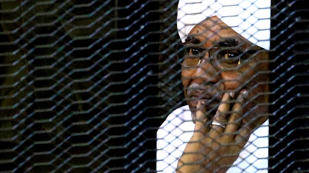 Sudan's former president Omar Hassan al-Bashir sits inside a cage at the courthouse where he is facing corruption charges, in Khartoum, Sudan September 28, 2019. REUTERS/Mohamed Nureldin Abdallah