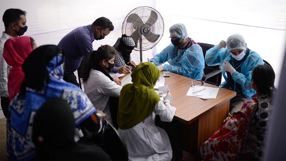 Bangladesh coronavirus test kit [Mahmud Hossain Opu/Al Jazeera]