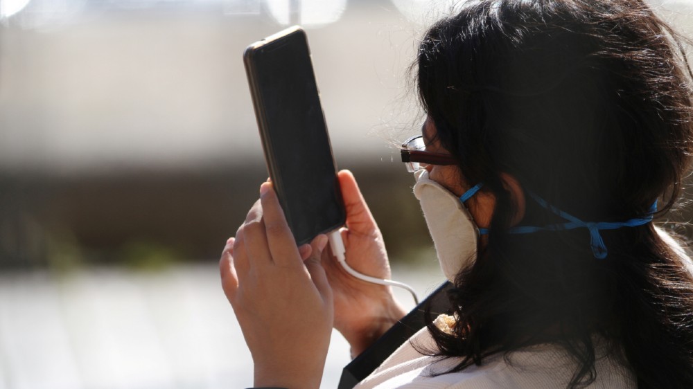 phone and mask - reuters