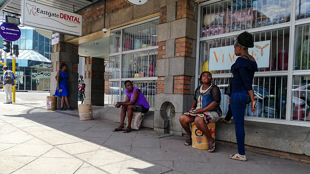 Illegal money traders who used to flood the streets of Harare and Mutare are now working from home amid the 21-day lockdown to curb the spread of Coronavirus [Farai Matiashe/Al Jazeera]
